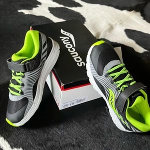 Saucony sneaker, size 6, brand new in box.